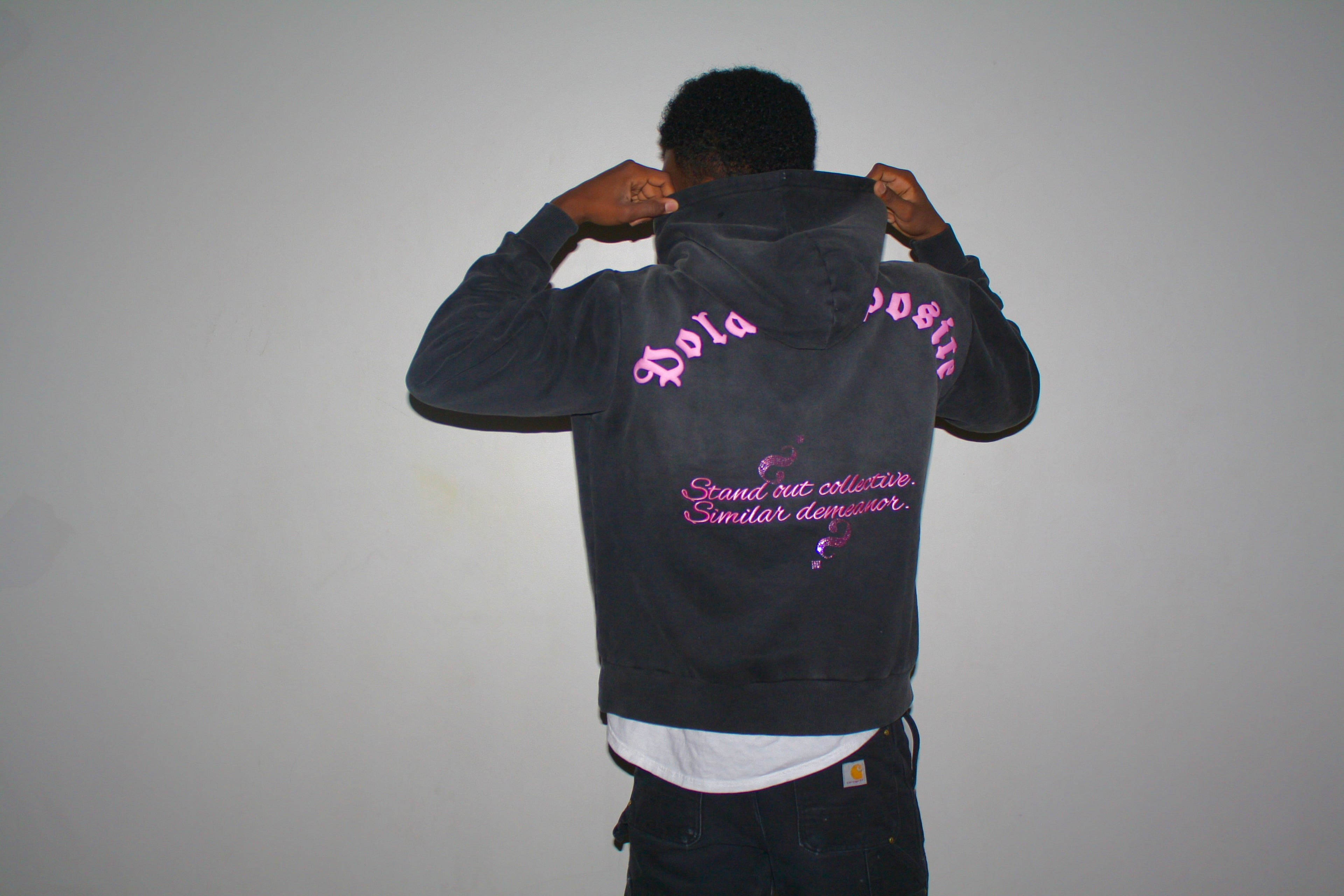Stand Out Collective pink logo hoodie being modeled